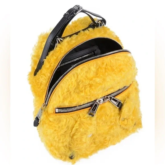 New never used …. Moschino Yellow Furry Fur  Backpack Another one. Hat & Bag: @jdfashionmonsta Coat: @shopakira  main image 3